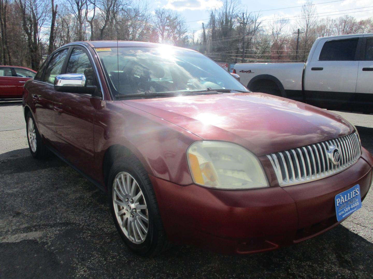 2005 RED Mercury Montego (1MEFM421X5G) with an 3.0L L4 DOHC 16V engine, AUTOMATIC transmission, located at 540a Delsea Drive, Sewell, NJ, 08080, (856) 589-6888, 39.752560, -75.111206 - Photo#7